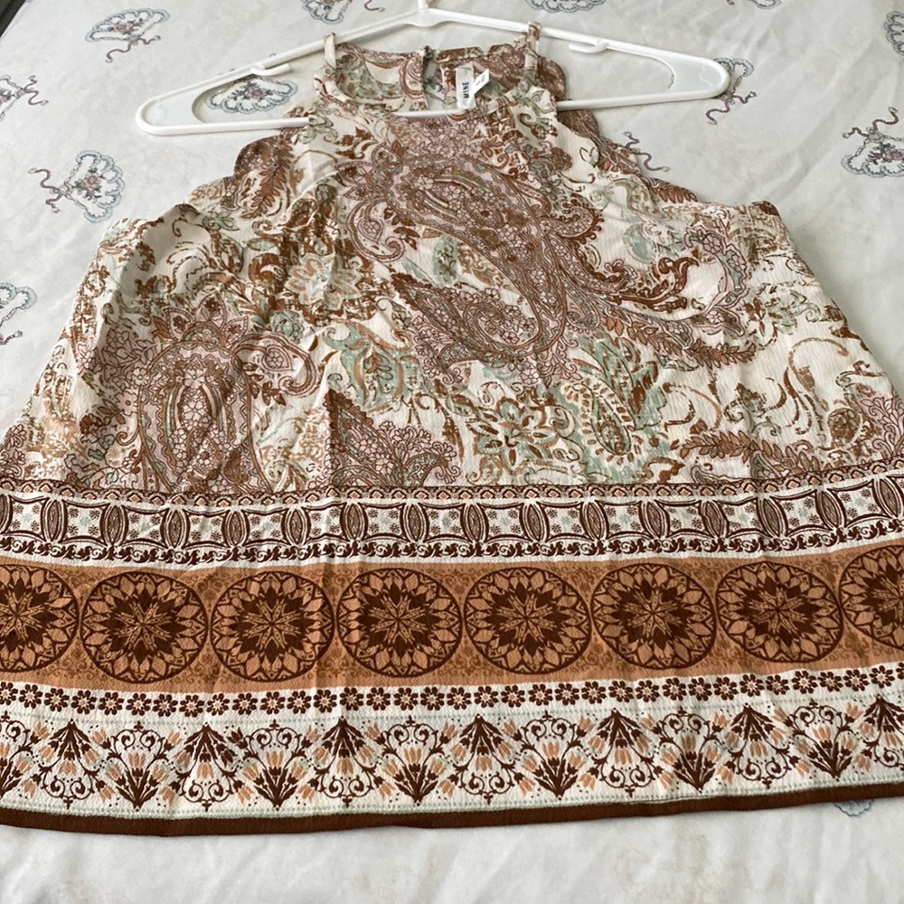 MINE Top Sz Small. Very versatile. Wear alone or under a blazer. NWT